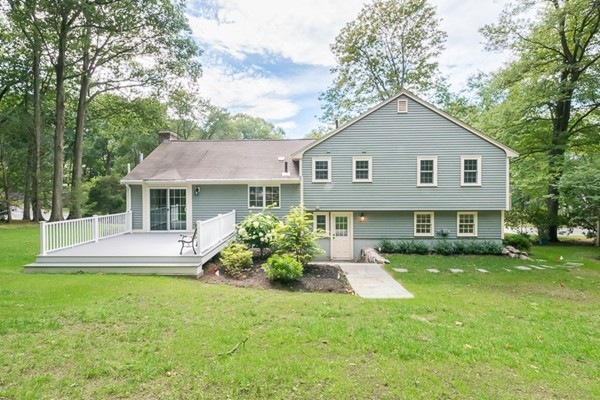 16 Mayflower Road Winchester, MA 01890 - Photo 20 of 23 a front view of house with yard and green space