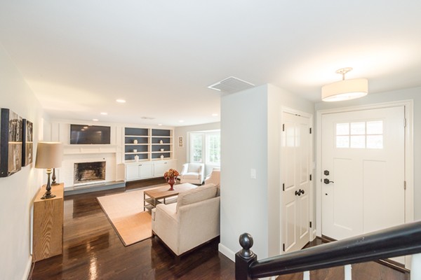 16 Mayflower Road Winchester, MA 01890 - Photo 2 of 23 a living room with furniture fireplace and flat screen tv