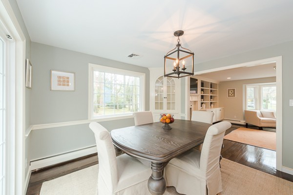 16 Mayflower Road Winchester, MA 01890 - Photo 5 of 23 a view of a dining room with furniture window and outside view