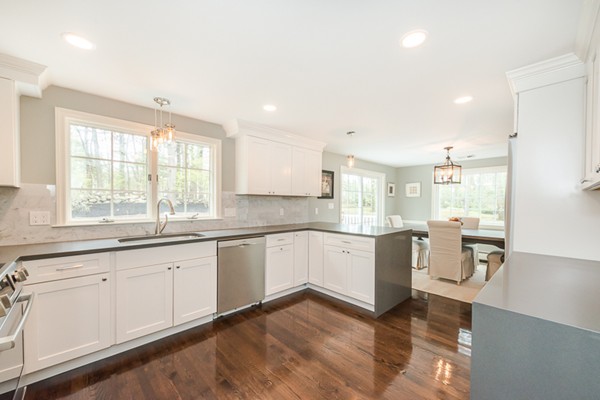 16 Mayflower Road Winchester, MA 01890 - Photo 8 of 23 a kitchen with a sink cabinets and wooden floor