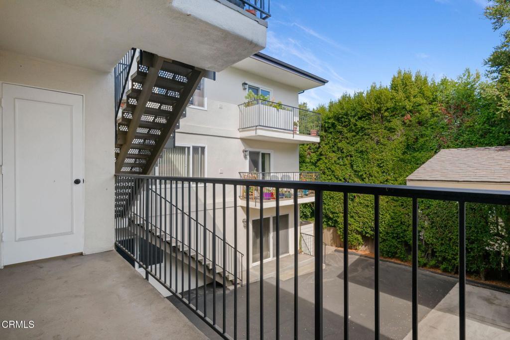 3914 Via Lucero, Unit B Santa Barbara, CA 93110 - Photo 13 of 22 a view of balcony with wooden floor and fence