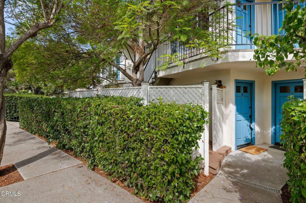 3914 Via Lucero, Unit B Santa Barbara, CA 93110 - Photo 2 of 22 a front view of a house with a yard