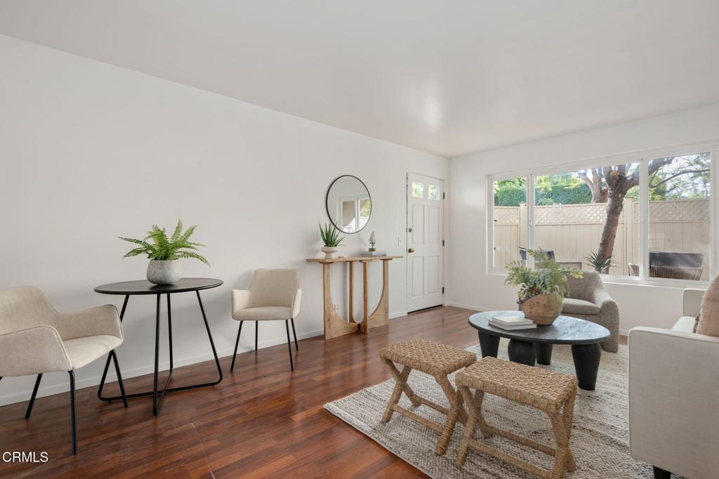3914 Via Lucero, Unit B Santa Barbara, CA 93110 - Photo 5 of 22 a view of a dining room with furniture window and wooden floor
