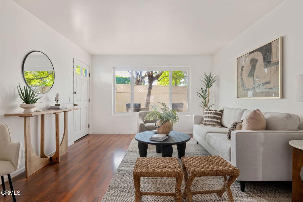 3914 Via Lucero, Unit B Santa Barbara, CA 93110 - Photo 6 of 22 a living room with furniture and a wooden floor