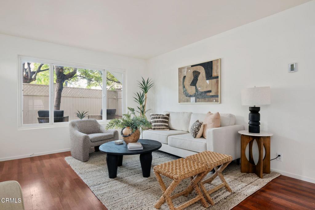 3914 Via Lucero, Unit B Santa Barbara, CA 93110 - Photo 7 of 22 a living room with furniture and a potted plant on table