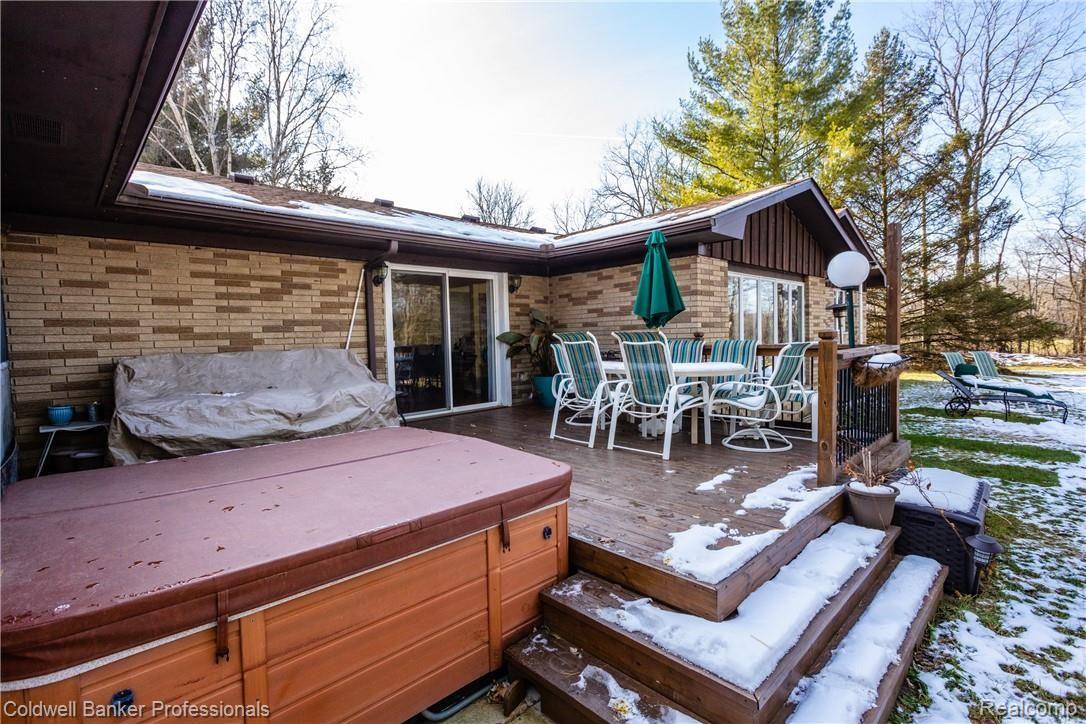 4777 Six Mile Road South Lyon, MI 48178 - Photo 53 of 71 Deck off the dining room to extend your entertainment space