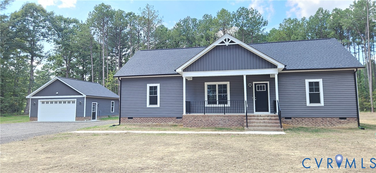 2982 Ashdale Road Center Cross, VA 22437 - Photo 1 of 23 Siding exterior with brick foundation, covered ent
