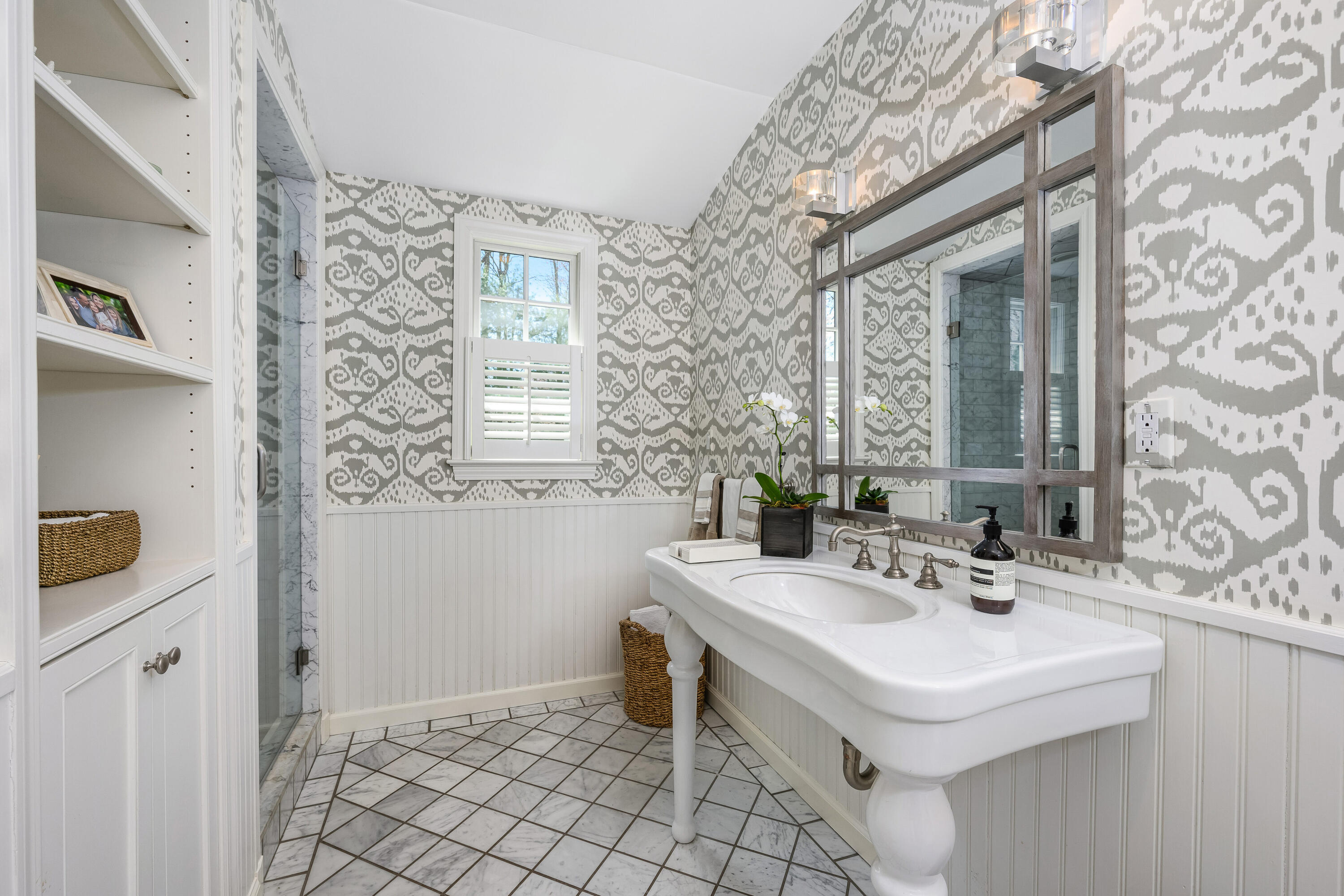 110 Stephen Mather Road Darien, CT 06820 - Photo 14 of 41 a bathroom with a sink and a mirror