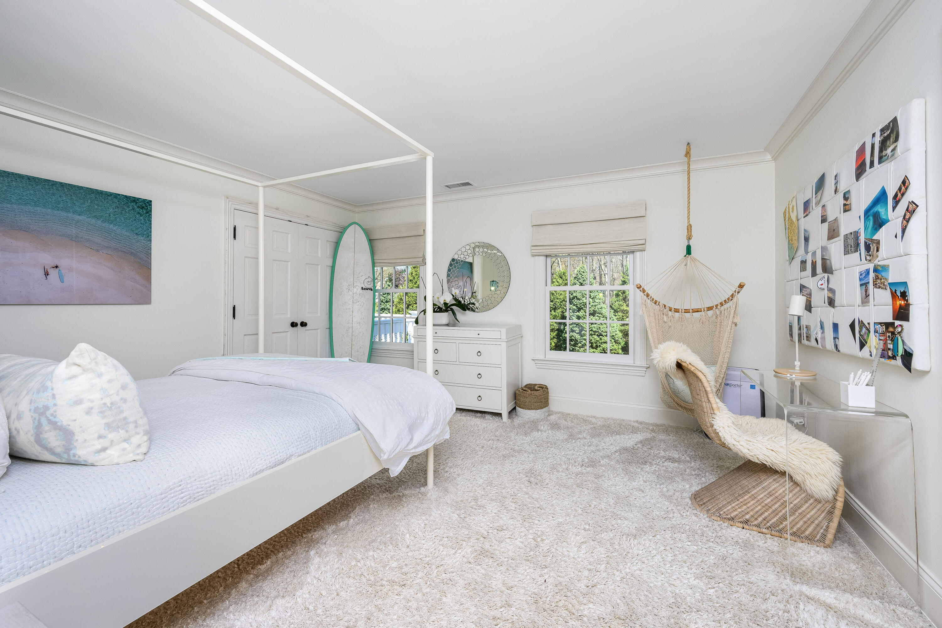 110 Stephen Mather Road Darien, CT 06820 - Photo 21 of 41 a bedroom with a bed couch and a window