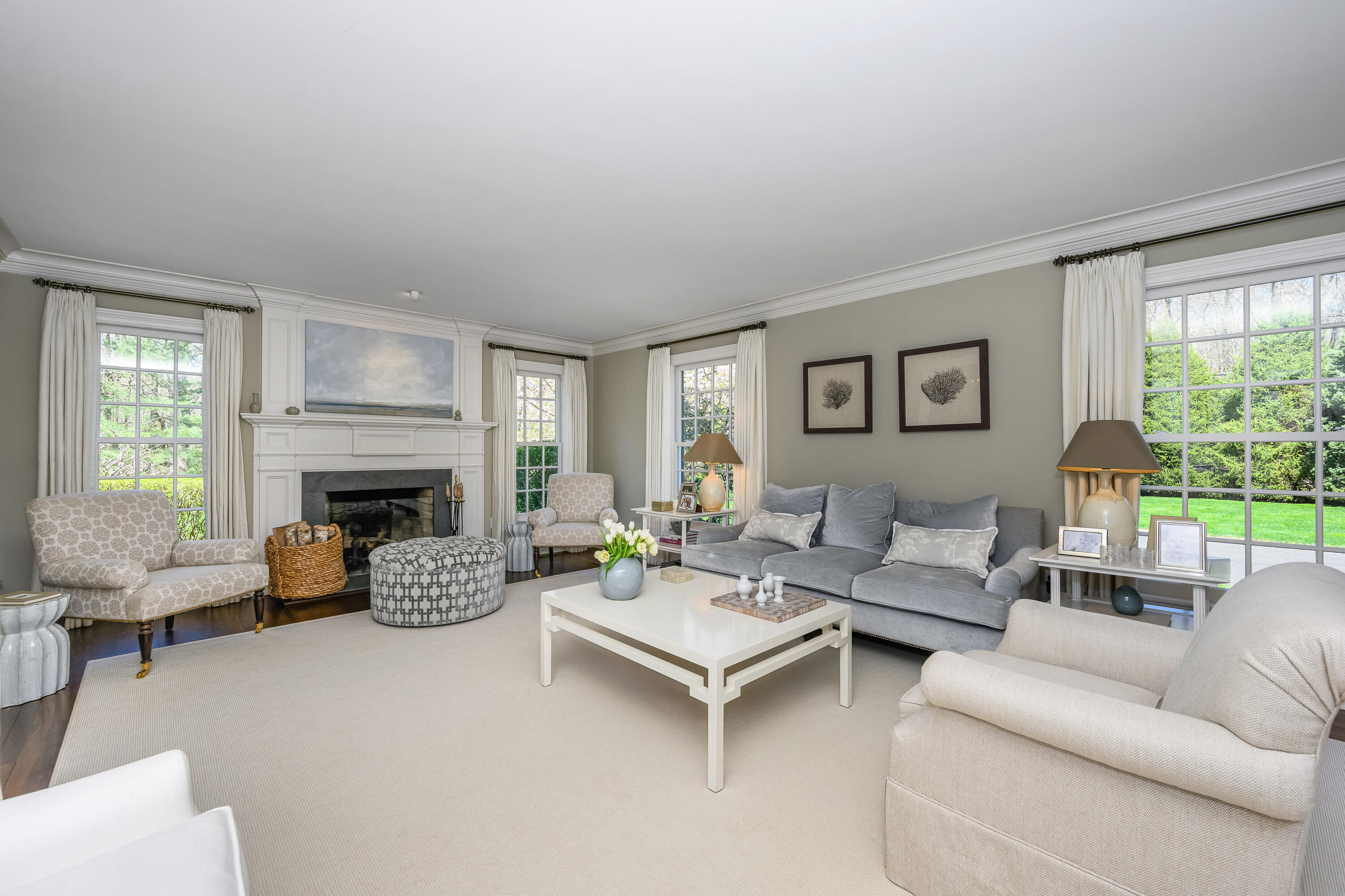 110 Stephen Mather Road Darien, CT 06820 - Photo 3 of 41 a living room with furniture and a fireplace