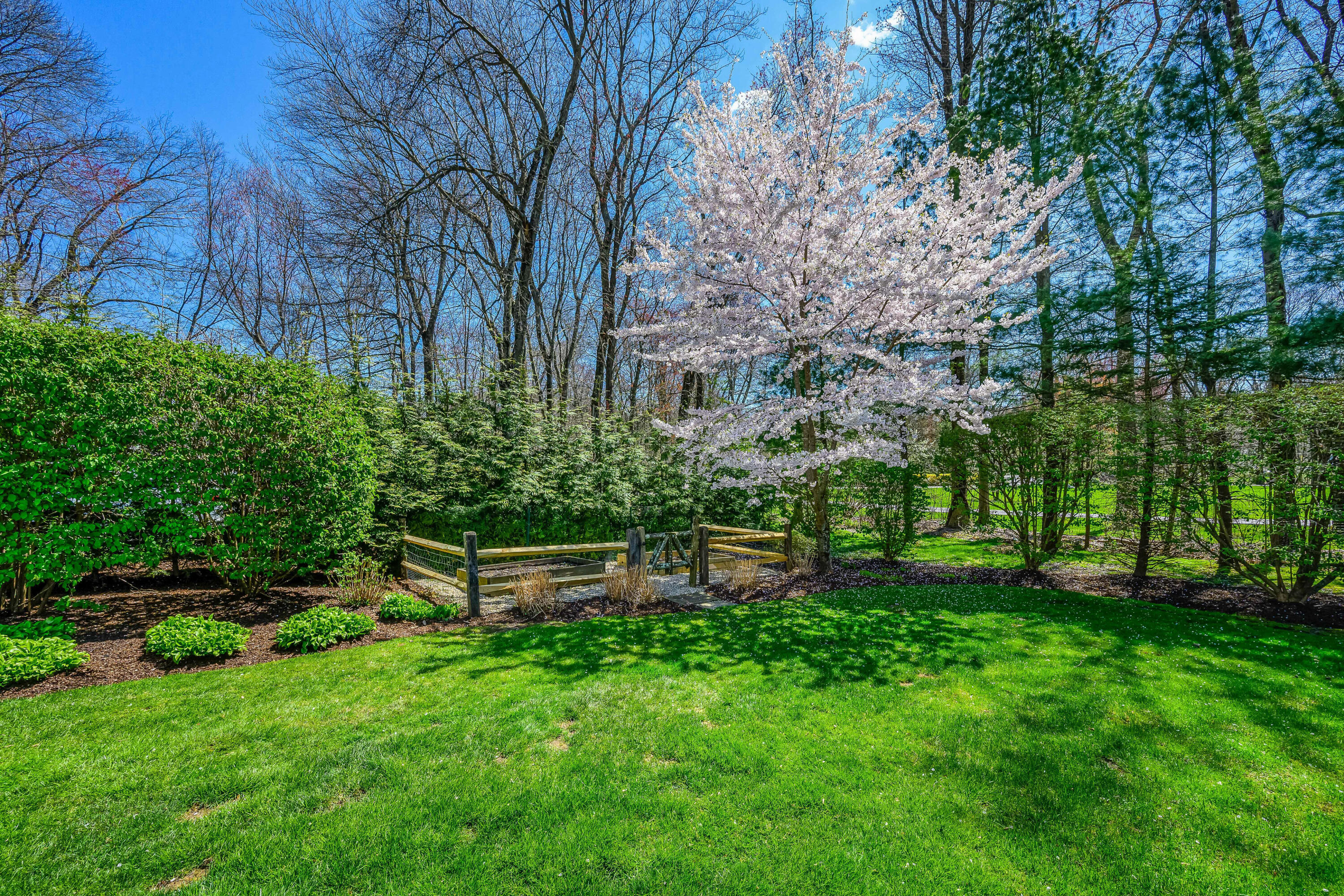 110 Stephen Mather Road Darien, CT 06820 - Photo 32 of 41 a view of a house with a yard