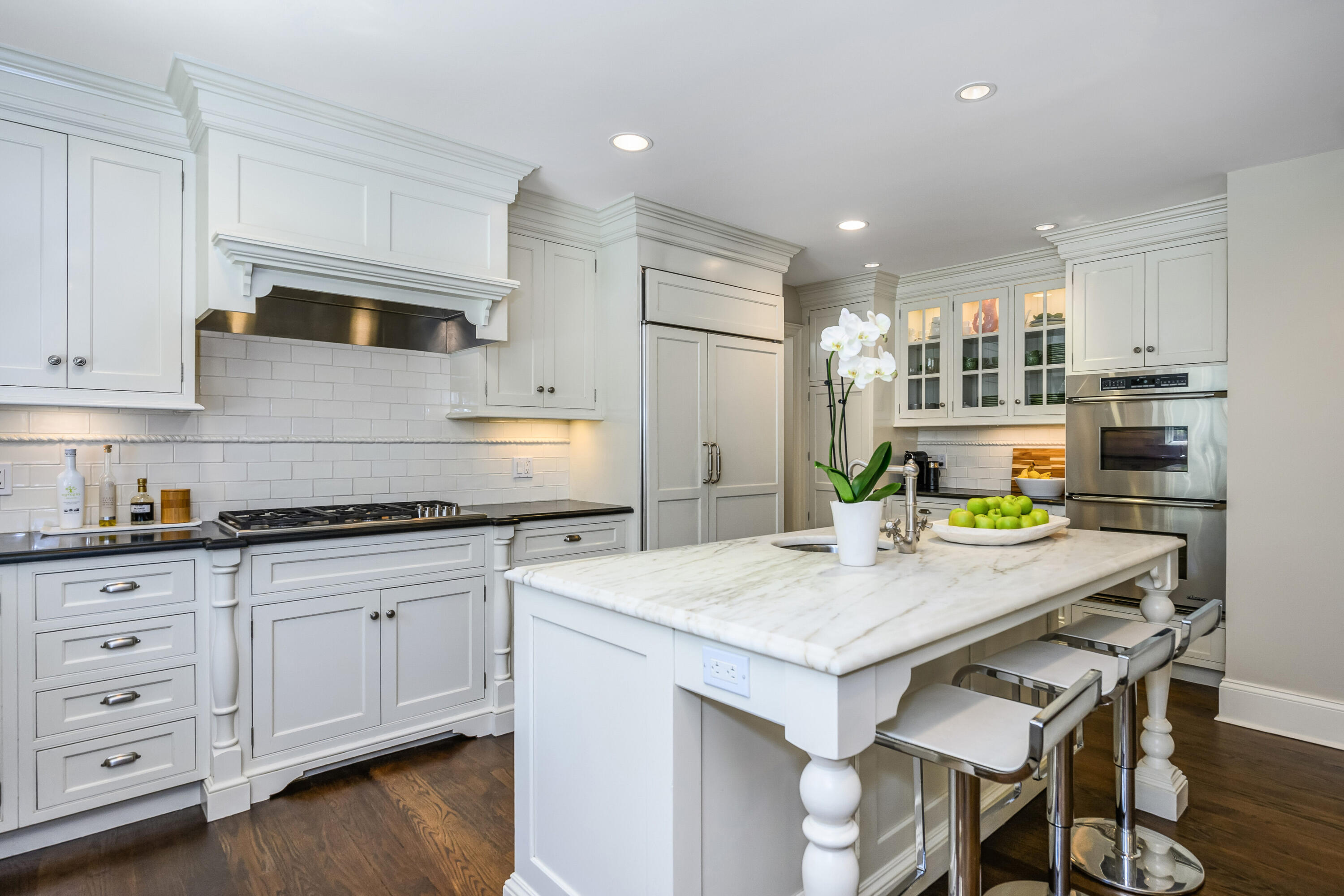 110 Stephen Mather Road Darien, CT 06820 - Photo 5 of 41 a kitchen with white cabinets stove and refrigerator