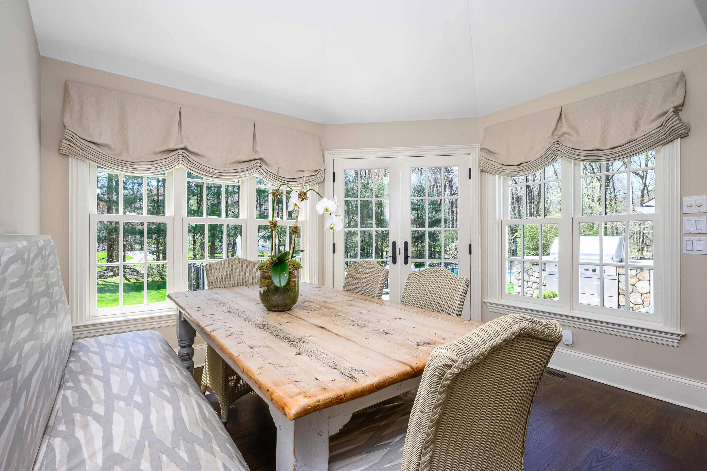 110 Stephen Mather Road Darien, CT 06820 - Photo 6 of 41 a living room with furniture and large windows
