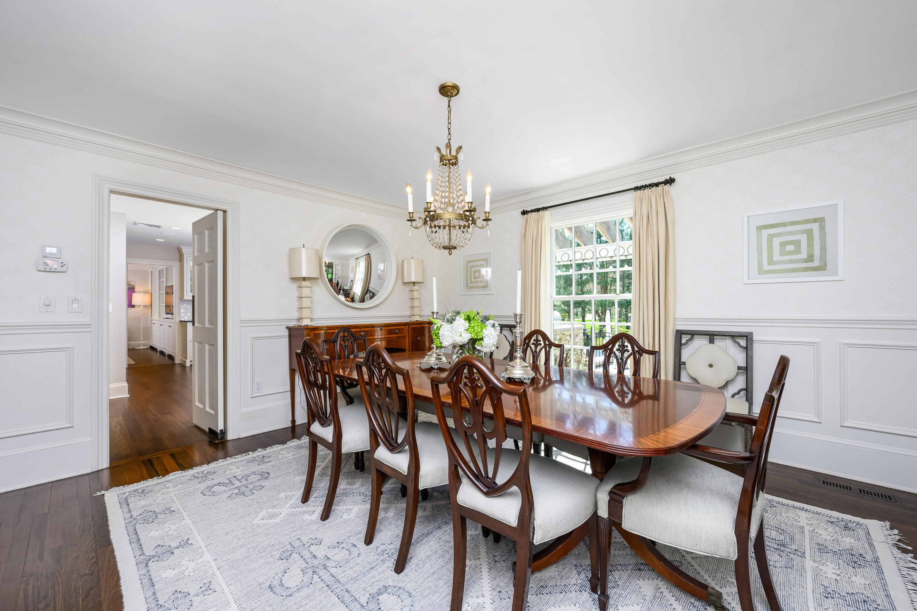110 Stephen Mather Road Darien, CT 06820 - Photo 7 of 41 a view of a dining room with furniture window and wooden floor