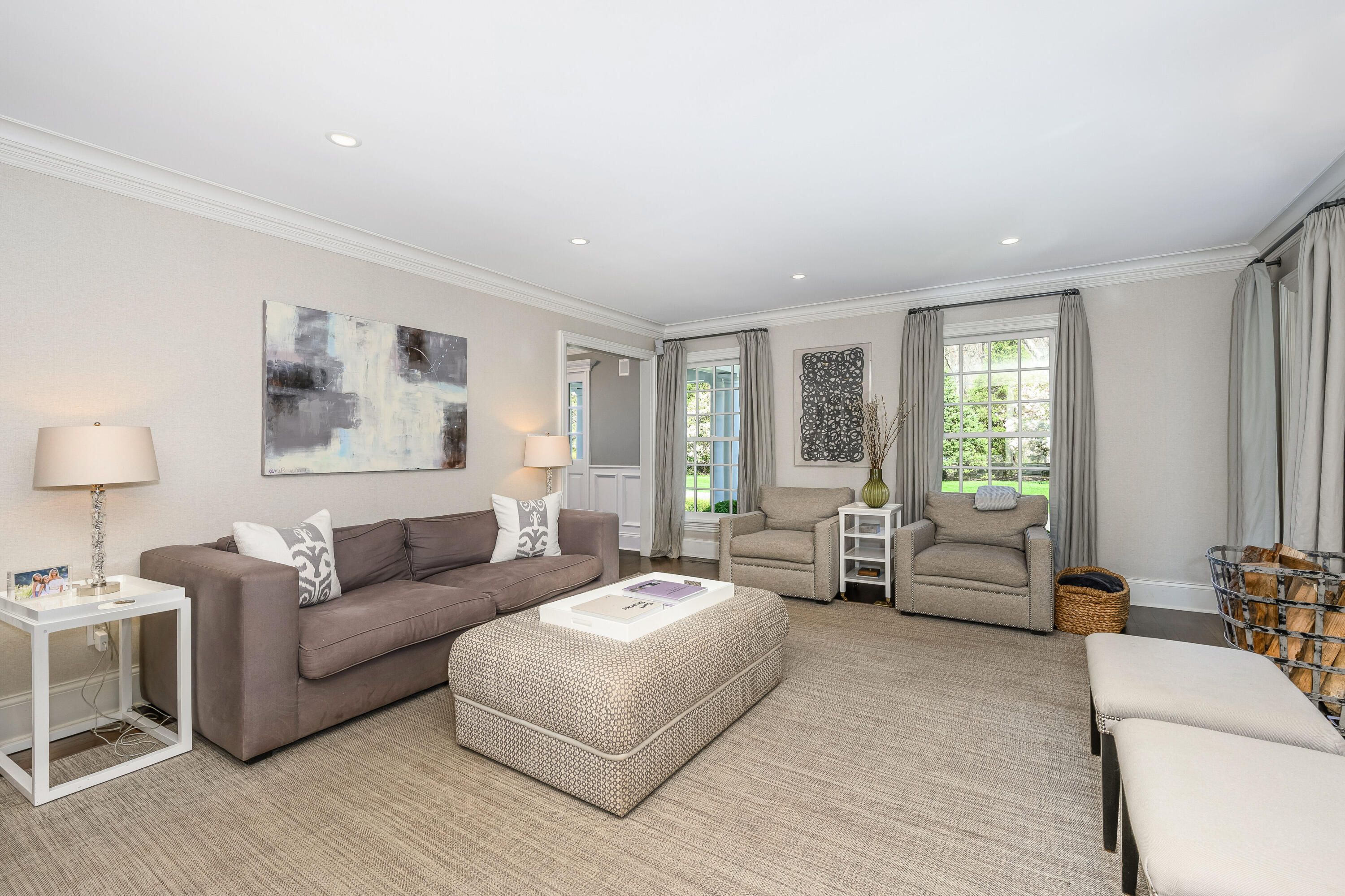 110 Stephen Mather Road Darien, CT 06820 - Photo 10 of 41 a living room with furniture and a large window
