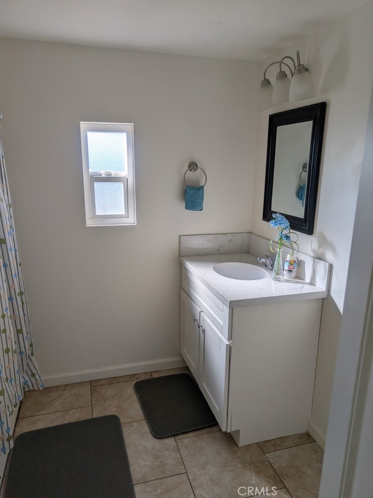 4287 Rosa Rancho Lane Fallbrook, CA 92028 - Photo 12 of 24 a utility room with a sink washer and dryer