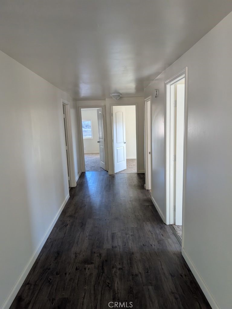 4287 Rosa Rancho Lane Fallbrook, CA 92028 - Photo 13 of 24 a view of a room with wooden floor