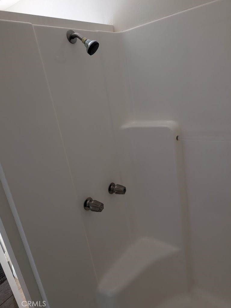 4287 Rosa Rancho Lane Fallbrook, CA 92028 - Photo 17 of 24 a close up of a shower