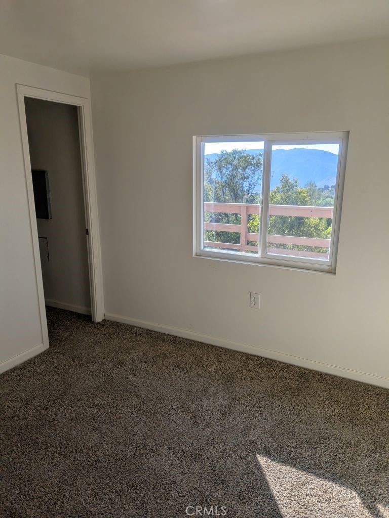 4287 Rosa Rancho Lane Fallbrook, CA 92028 - Photo 19 of 24 an empty room with a window