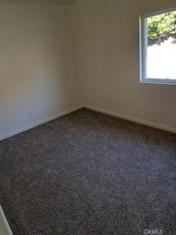 a view of an empty room with window