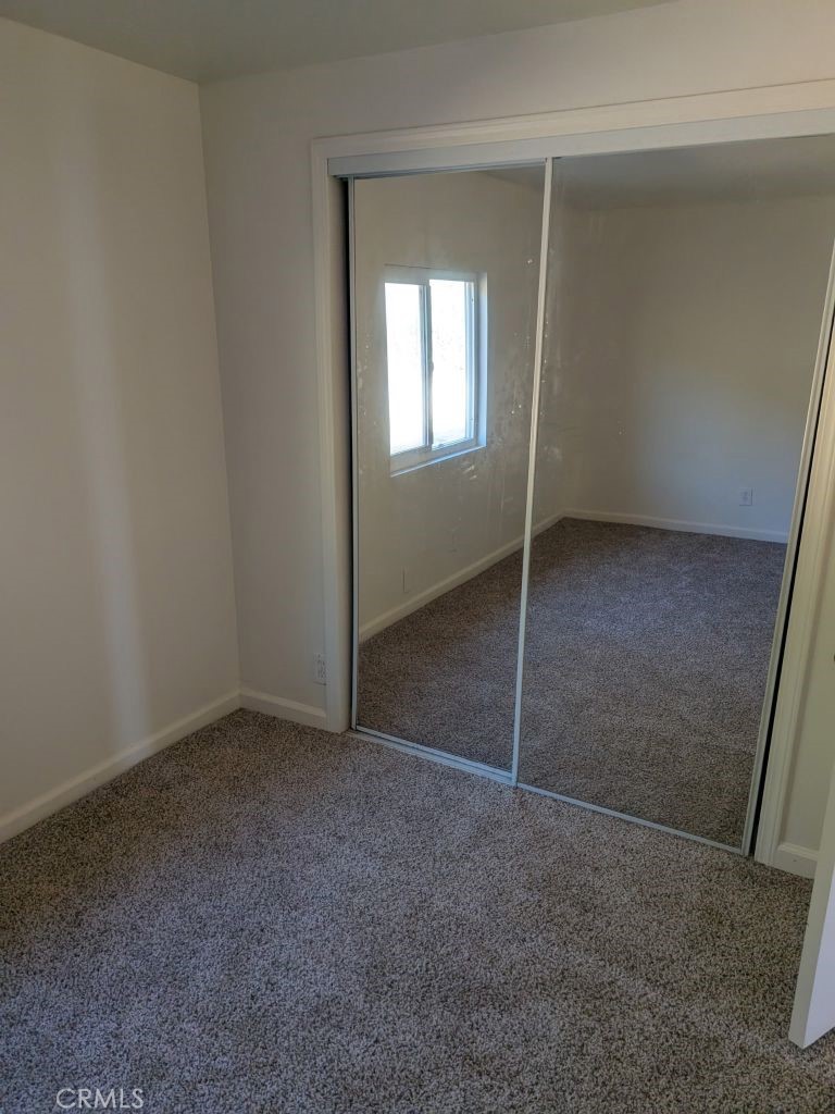 4287 Rosa Rancho Lane Fallbrook, CA 92028 - Photo 21 of 24 a view of an empty room with window