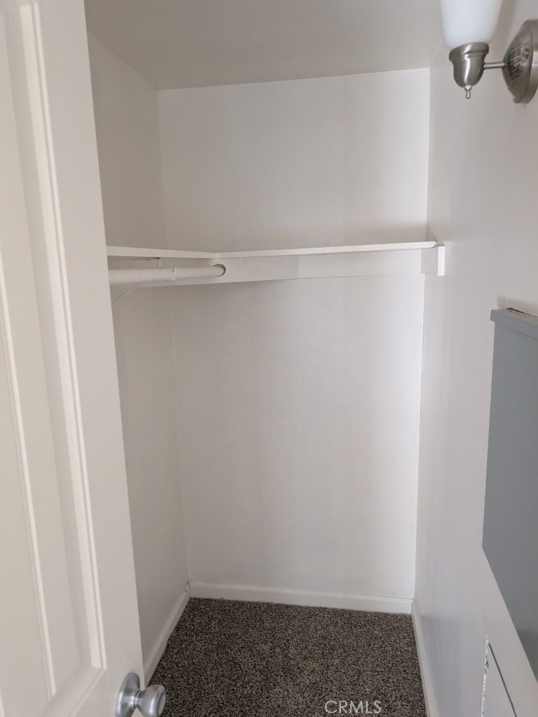 4287 Rosa Rancho Lane Fallbrook, CA 92028 - Photo 23 of 24 a view of walk in closet with empty racks