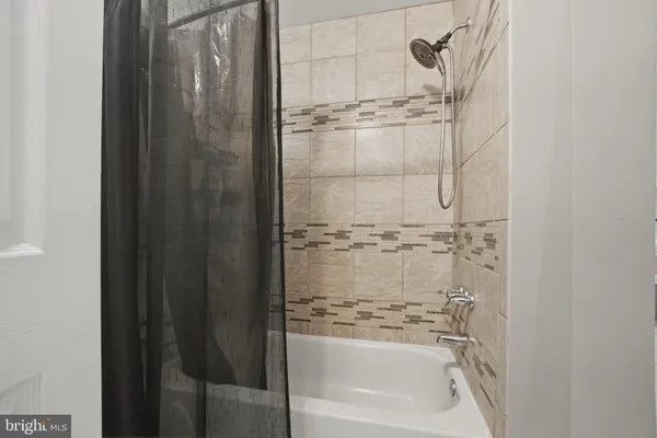 a bathroom with a bathtub