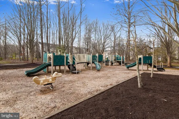 a view of a park with swings