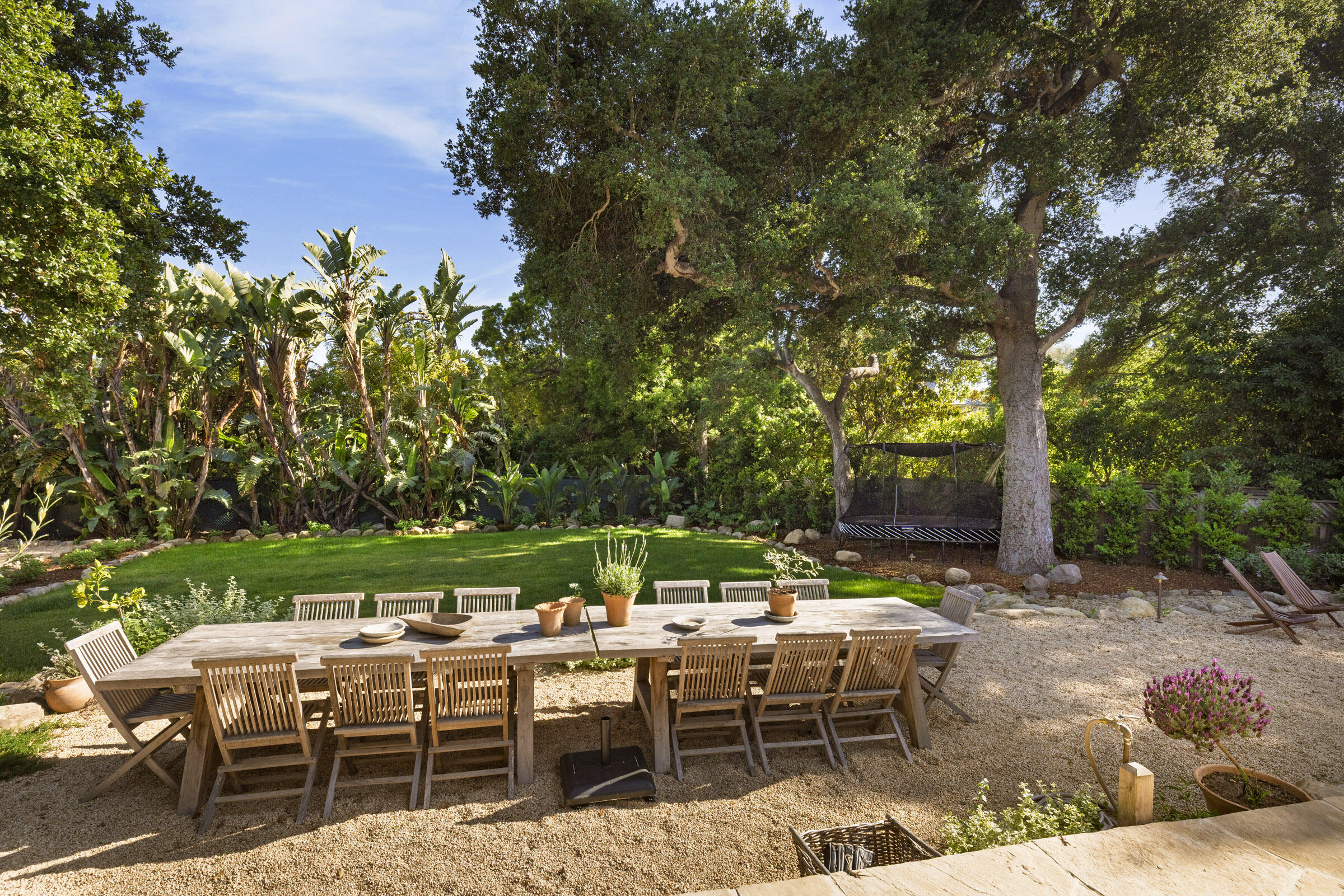 1575 East Valley Road Montecito, CA 93108 - Photo 21 of 30 a view of a tables and chairs in a backyard