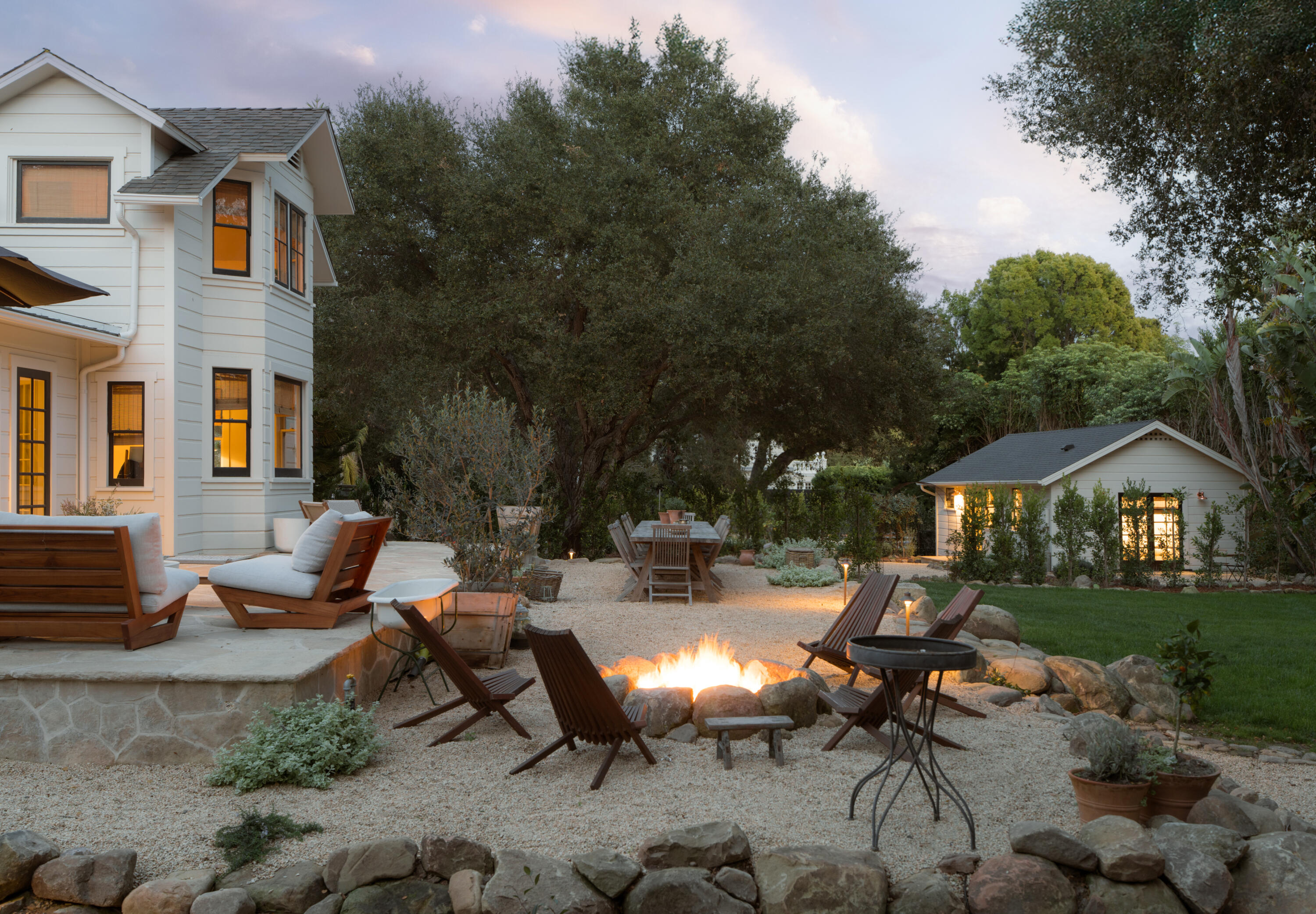 1575 East Valley Road Montecito, CA 93108 - Photo 23 of 30 a view of a patio with table and chairs and potted plants