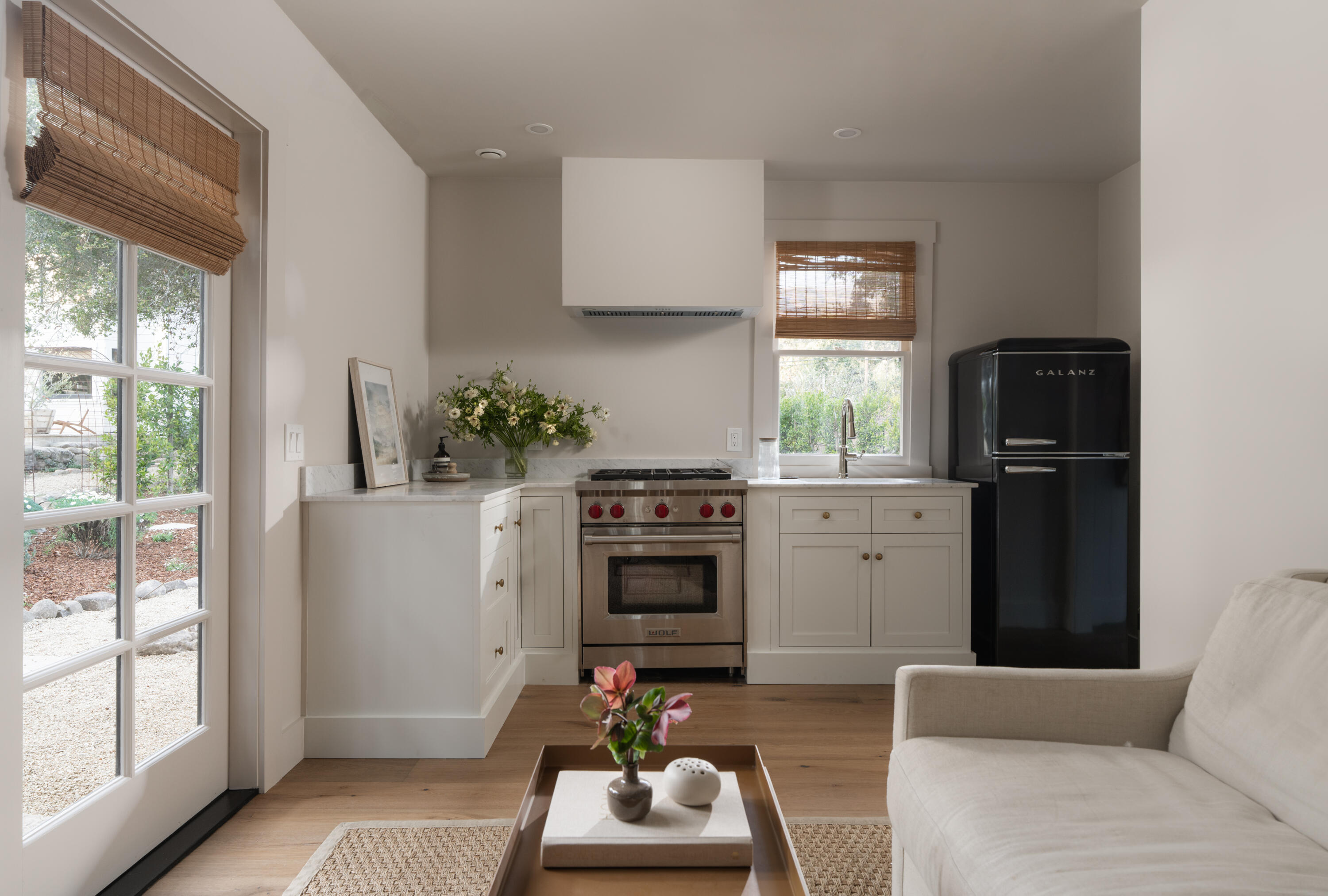 1575 East Valley Road Montecito, CA 93108 - Photo 27 of 30 a living room with furniture a window and storage space
