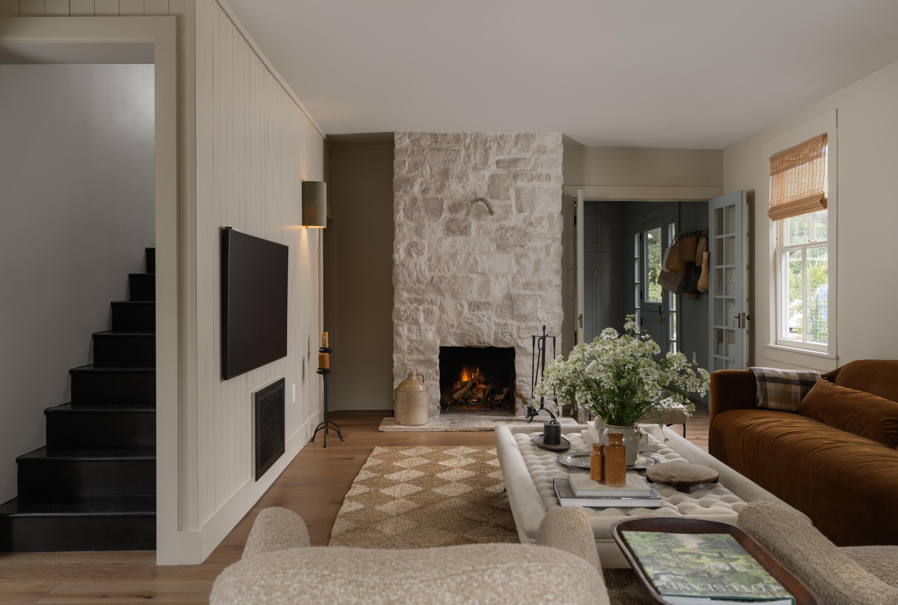 1575 East Valley Road Montecito, CA 93108 - Photo 7 of 30 a living room with furniture and a fireplace