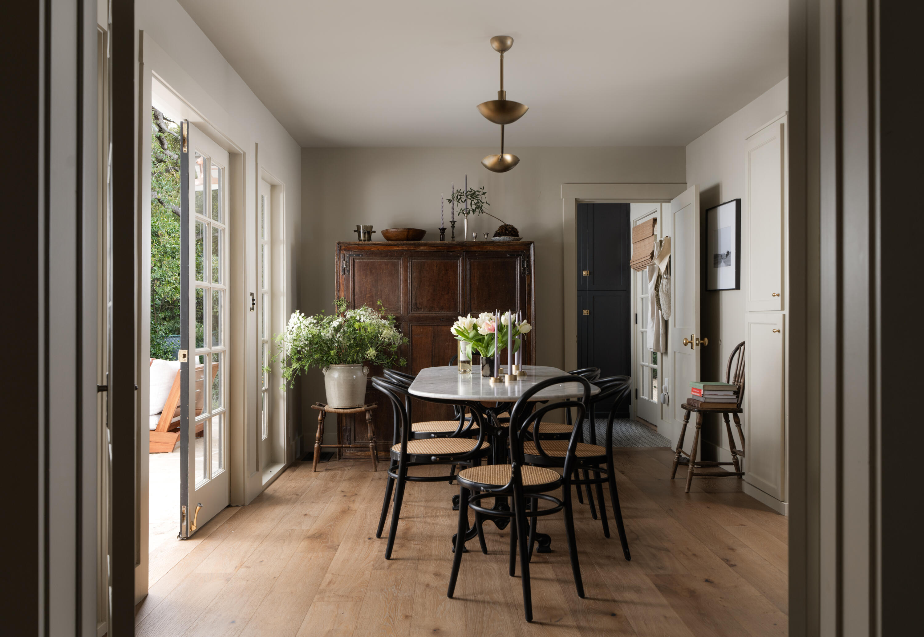 1575 East Valley Road Montecito, CA 93108 - Photo 9 of 30 a view of a dining room with furniture and a potted plant