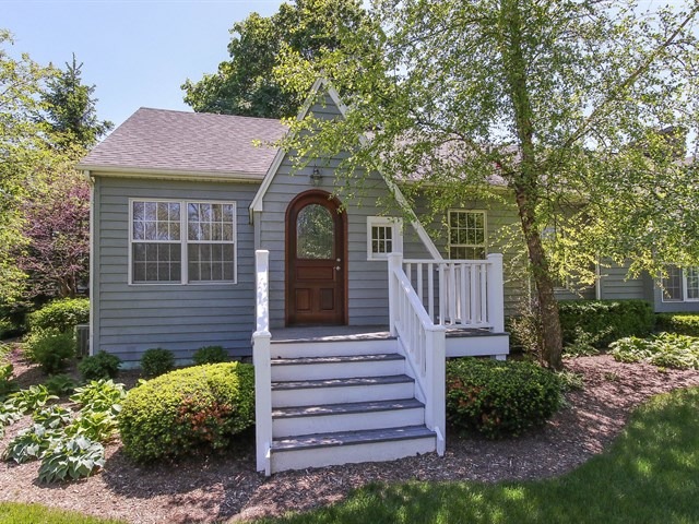 243 Bradwell Road Inverness, IL 60010 - Photo 2 of 25 a front view of a house with a yard