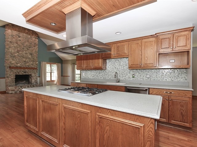 243 Bradwell Road Inverness, IL 60010 - Photo 5 of 25 a kitchen with stainless steel appliances granite countertop a sink stove and cabinets