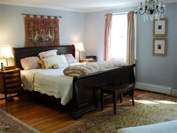 14 Springdale Avenue Wellesley, MA 02481 - Photo 8 of 13 a bedroom with a bed and a chandelier