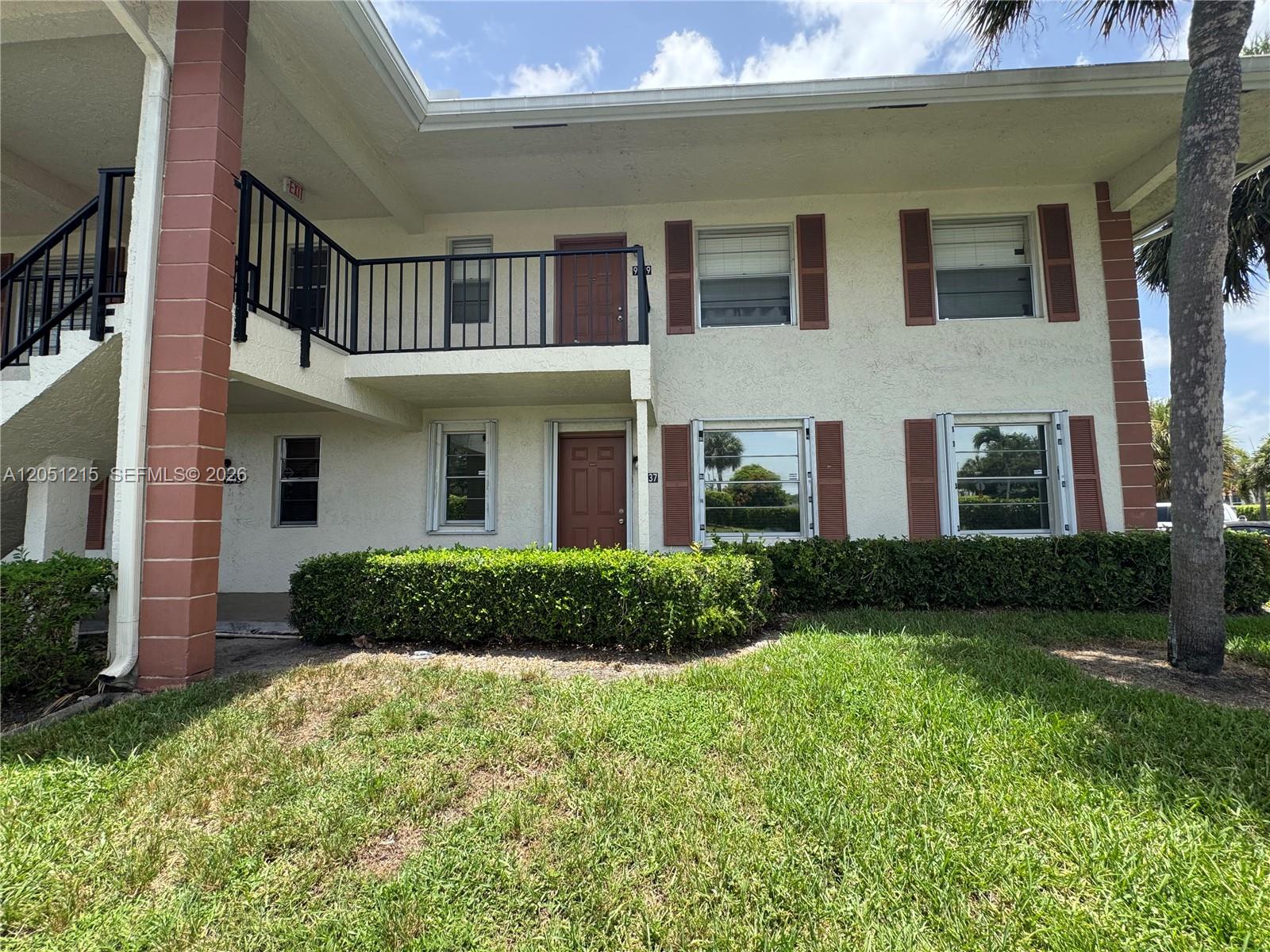 9937 Three Lakes Circle, Unit 14D Boca Raton, FL 33428 - Photo 1 of 22 front view