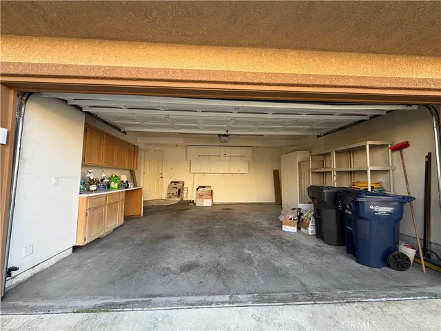 a view of living room with furniture and cabinets