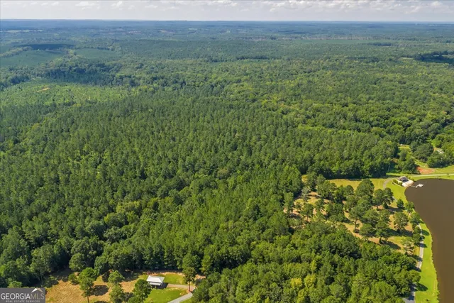 a view of a lake with a yard