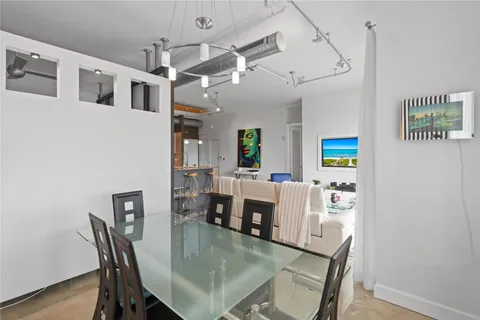 a room with a table and chairs