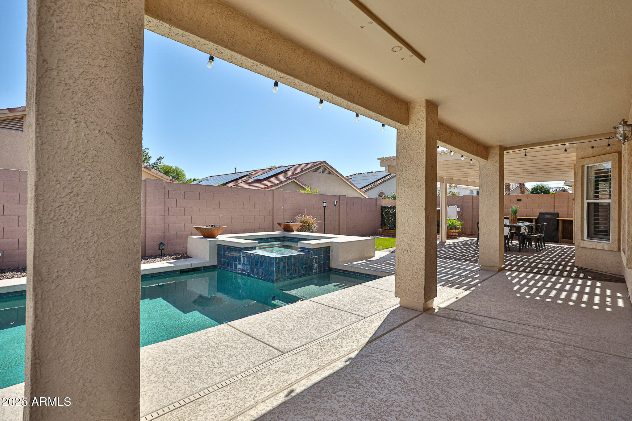 15731 West Redfield Road Surprise, AZ 85379 - Photo 37 of 48 a view of balcony with two potted plants
