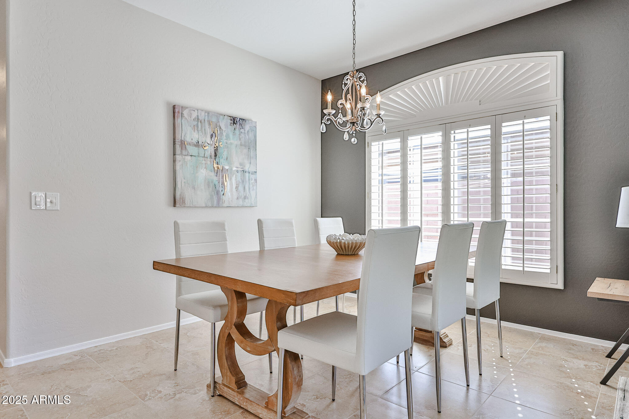 15731 West Redfield Road Surprise, AZ 85379 - Photo 5 of 48 a view of a dining room with furniture window and wooden floor