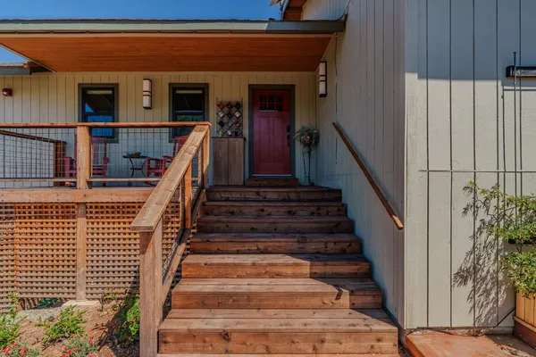 a house with a yard in front of it