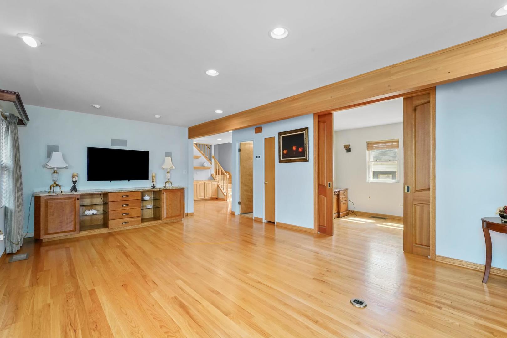 5751 South Monitor Avenue Chicago, IL 60638 - Photo 4 of 30 a living room with furniture and a flat screen tv