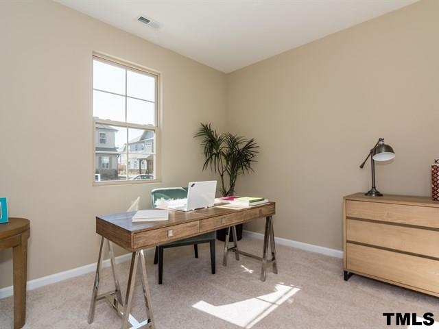 680 Wickham Ridge Road, Unit 146 Apex, NC 27539 - Photo 14 of 24 Guest suite or Study on first floor with Full Bath