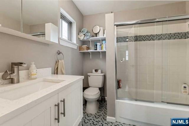 23 Asmus Road Closter, NJ 07624 - Photo 19 of 38 a bathroom with a sink a toilet and shower