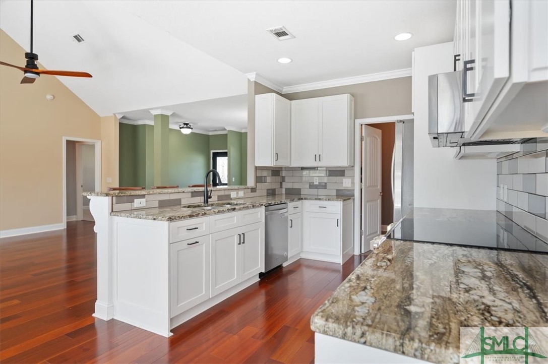111 Tolliver Lane Rincon, GA 31326 - Photo 14 of 39 Kitchen is open to the great room and features new