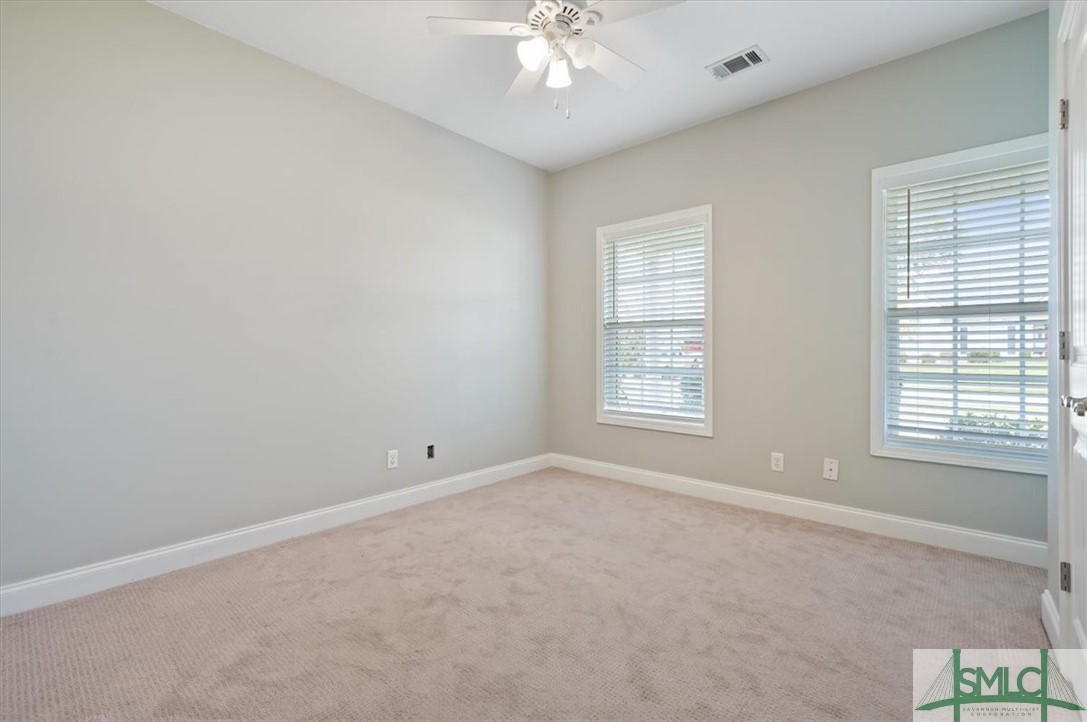 111 Tolliver Lane Rincon, GA 31326 - Photo 25 of 39 Bedroom three with lots of natural light!