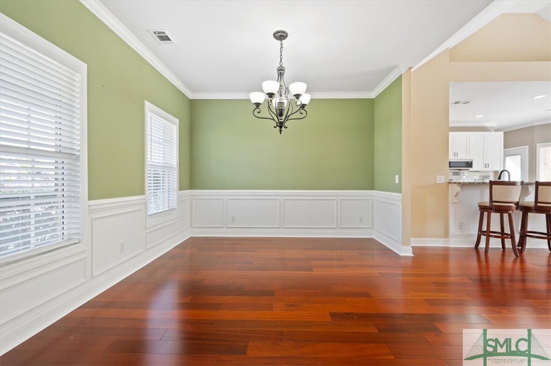 111 Tolliver Lane Rincon, GA 31326 - Photo 8 of 39 Formal dining room with real hardwood flooring and