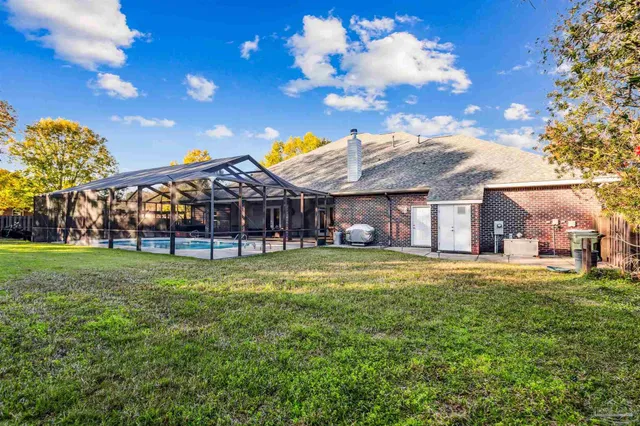 a view of a house with a big yard